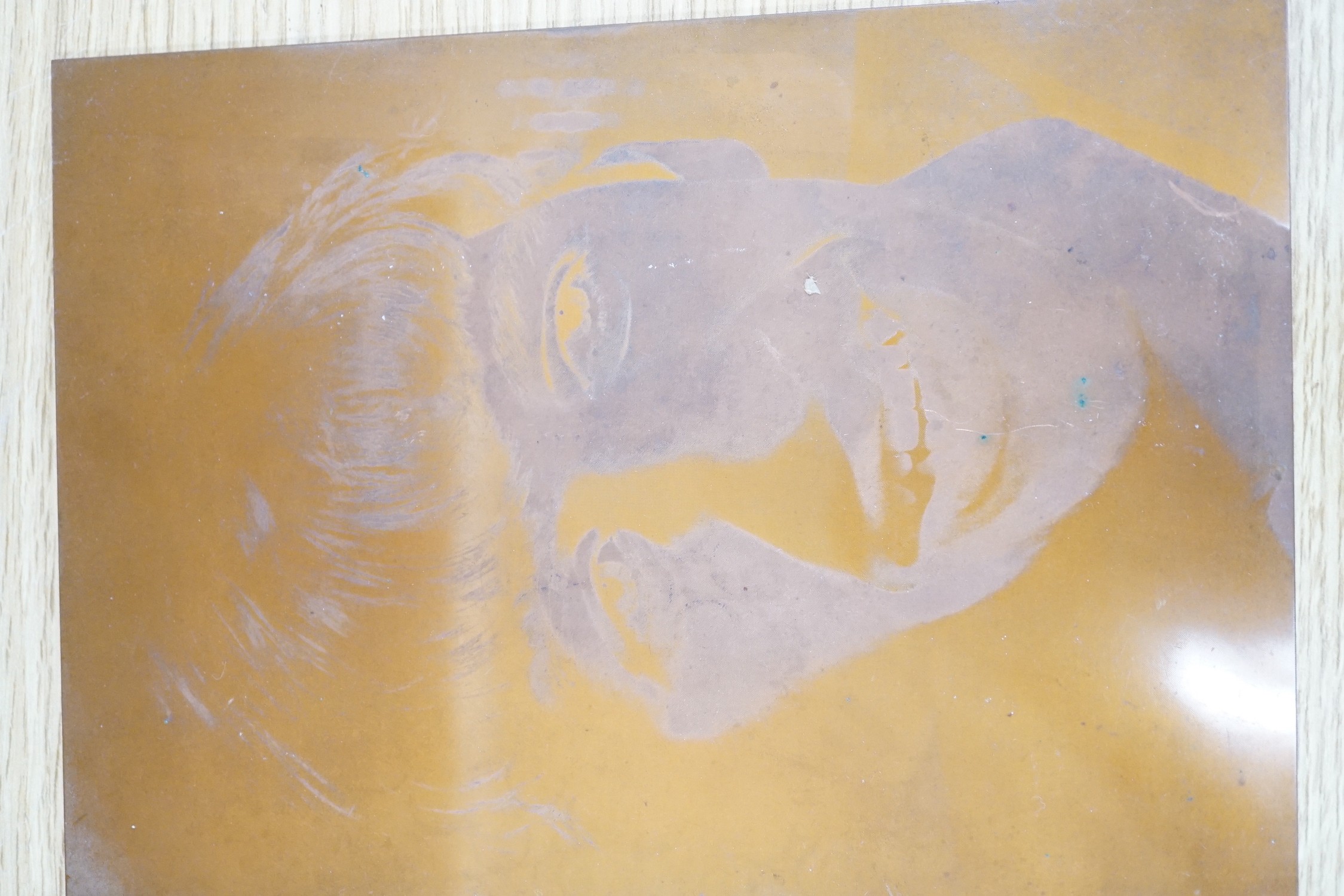 Two copper printing plates depicting two members of The Beatles, Ringo Starr and George Harrison. 22x16cm